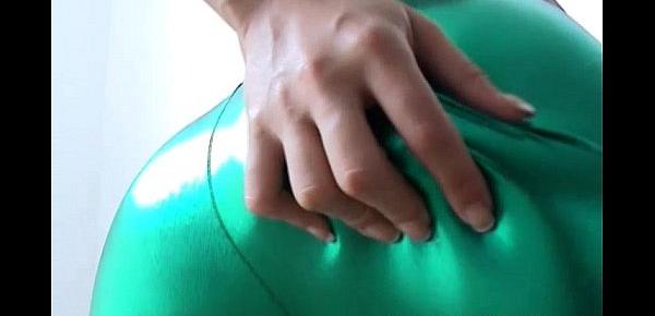  Sasha teasing in shiny green PVC panties